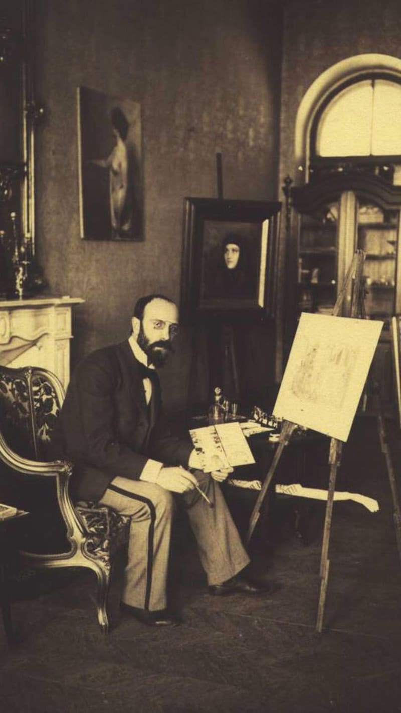 Victor Stember in a flat cap holding a palette beside a full-length portrait of a woman in a wide hat and a painting of a standing nude