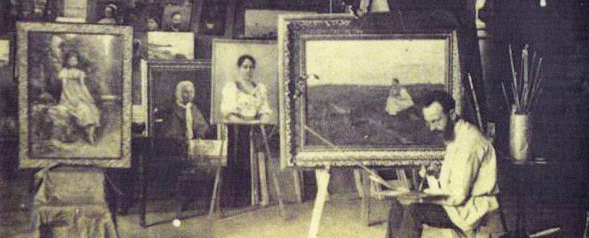 Victor Stember seated at his easel painting a coastal landscape, surrounded by framed portraits including a girl in a wide hat and a woman in a peasant blouse